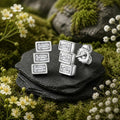 Rhodinierte Ohrstecker aus 925 Sterling Silber mit drei rechteckigen weißen Zirkonia im Baguette-Schliff